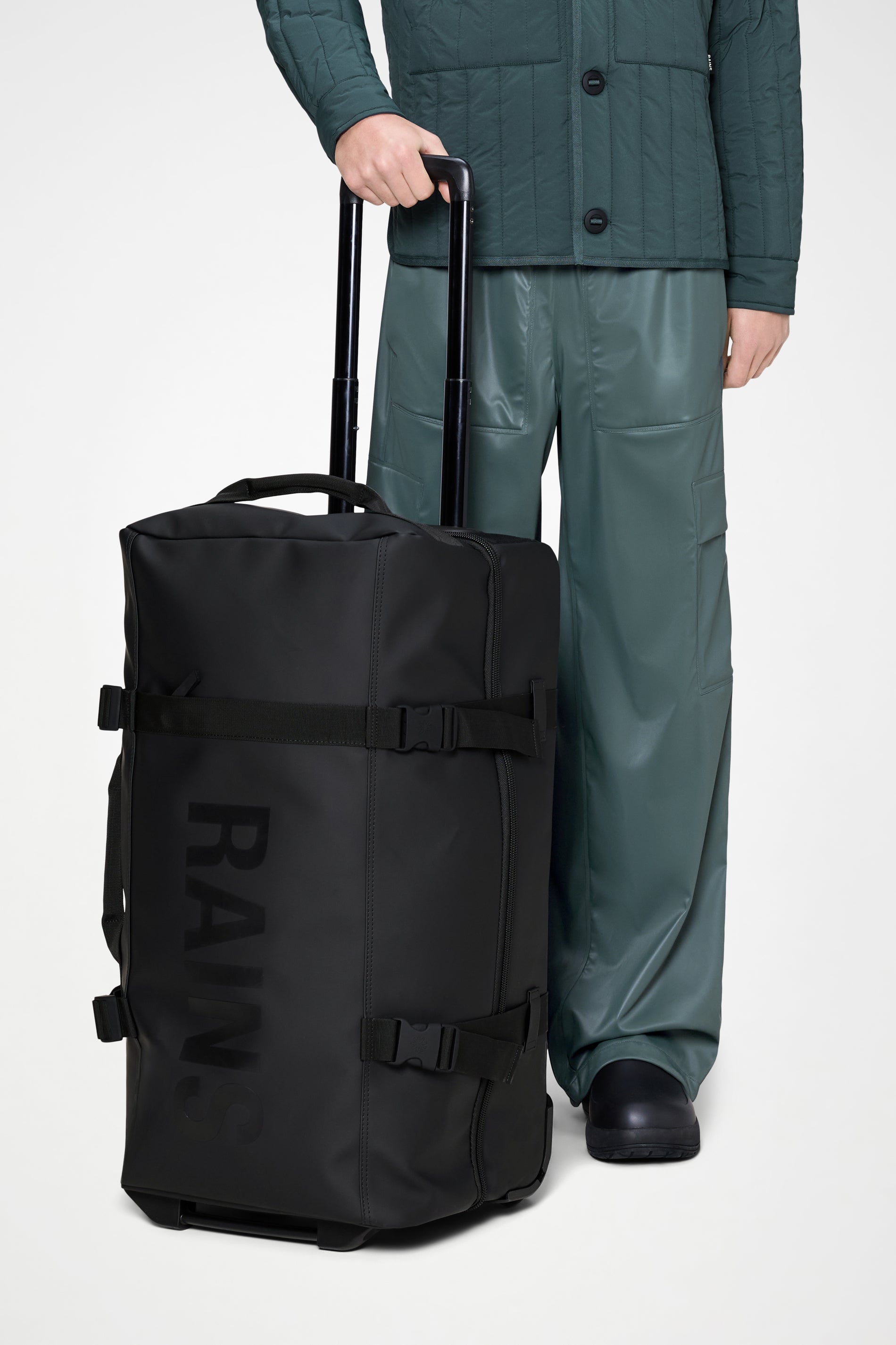 RAINS Texel Check-in Bag Black 76L H66 x D31 x W38 cm Suitcase